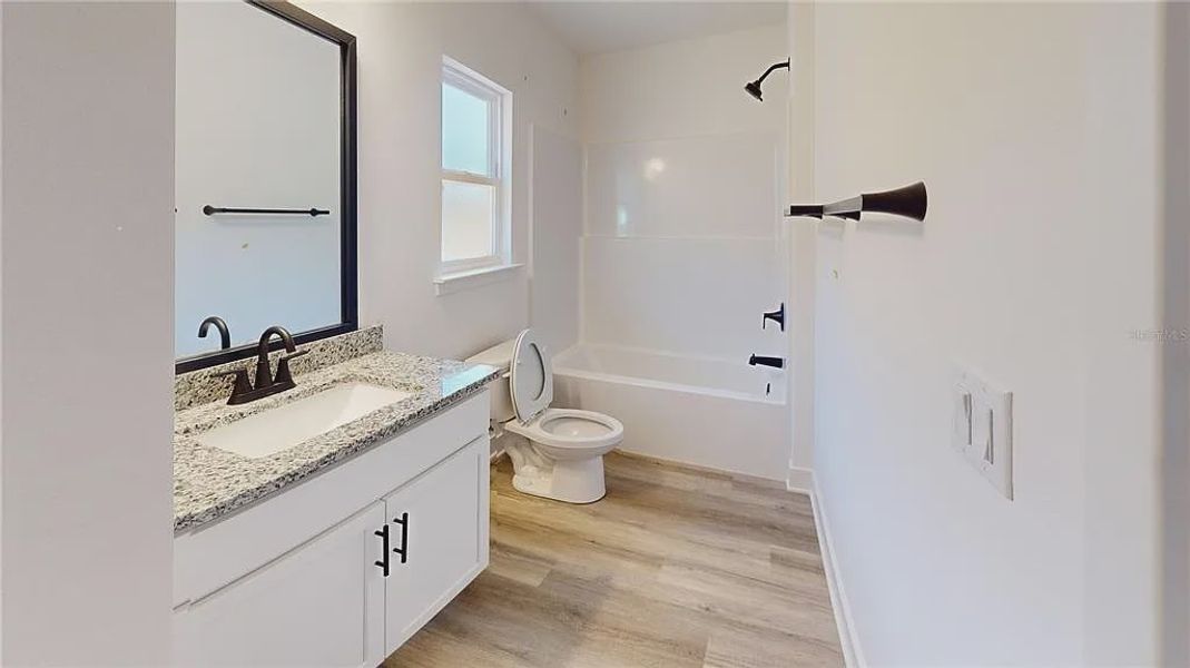 Furnished interior view inside a new home in Briarwood, Alachua (Image 13).