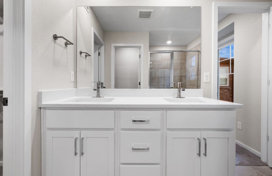 Furnished interior in a model home at Painted Prairie in Aurora (Image 26).