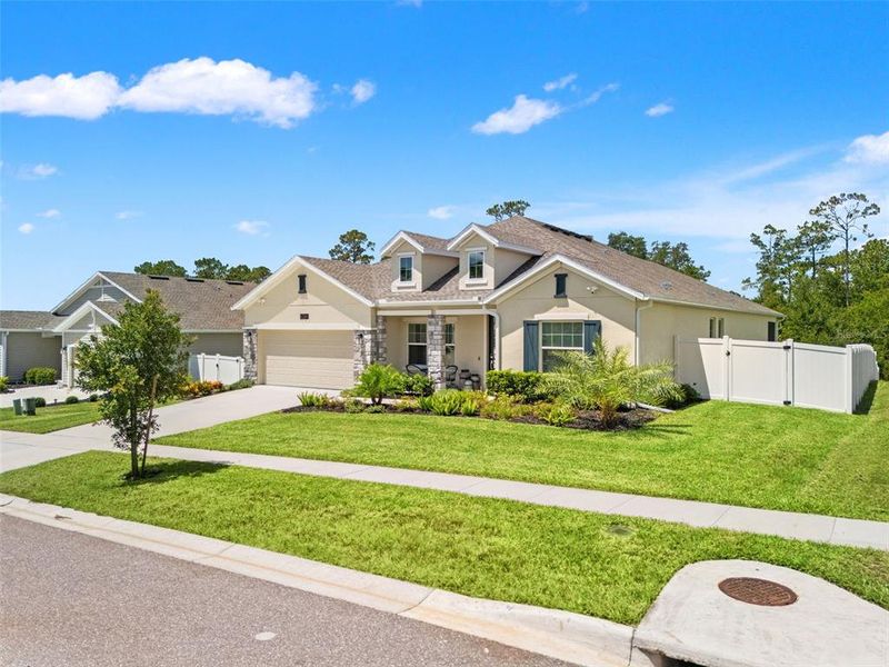 Front exterior of a new home in , Mount Dora, FL, highlighting curb appeal (Image 30). Front exterior of a new home in , Mount Dora, FL, highlighting curb appeal (Image 30).