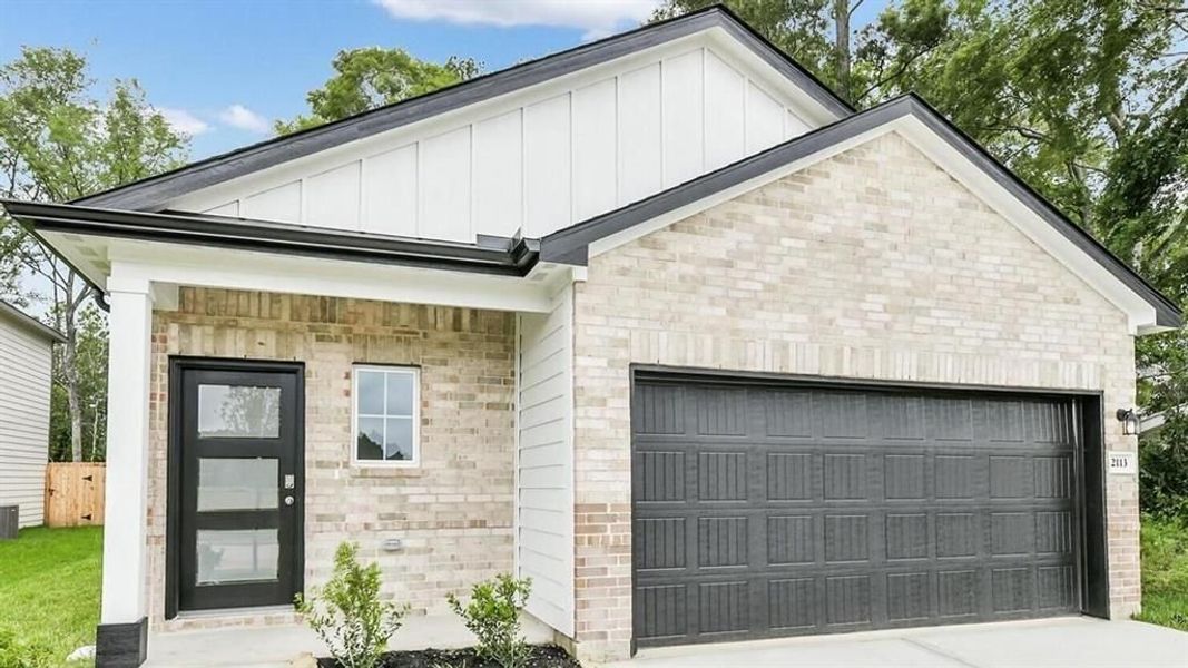 Front exterior of a new home in Caney Creek Place, Conroe, TX, highlighting curb appeal (Image 57).