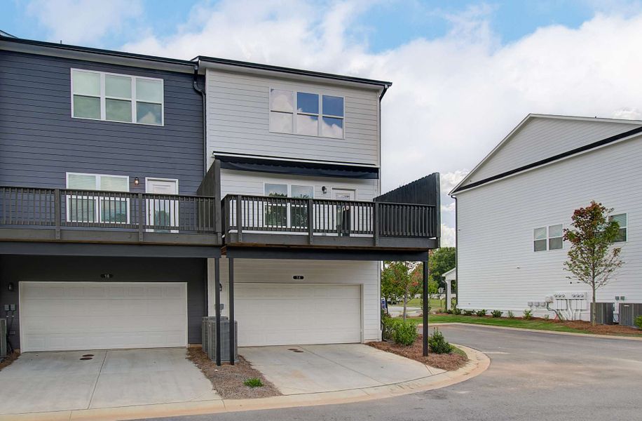 Front exterior of a new home in Nickel Creek at Newnan Crossing, Newnan, GA, highlighting curb appeal (Image 28). Front exterior of a new home in Nickel Creek at Newnan Crossing, Newnan, GA, highlighting curb appeal (Image 28).