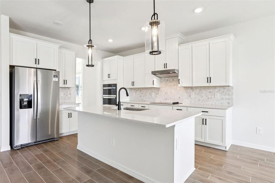 Furnished interior view inside a new home in Two Rivers - Signature Series, Zephyrhills (Image 5). Furnished interior view inside a new home in Two Rivers - Signature Series, Zephyrhills (Image 5).