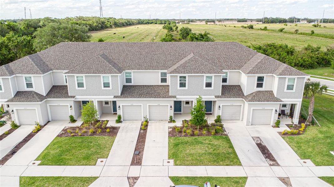 Front exterior of a new home in , St. Cloud, FL, highlighting curb appeal (Image 19).