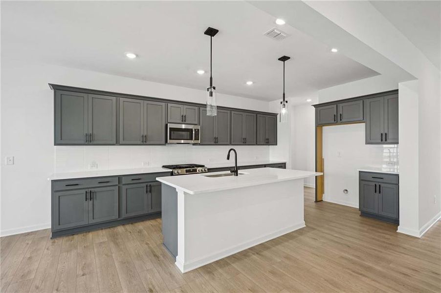 Furnished interior view inside a new home in Eastlyn Crossing, Flowery Branch (Image 7).