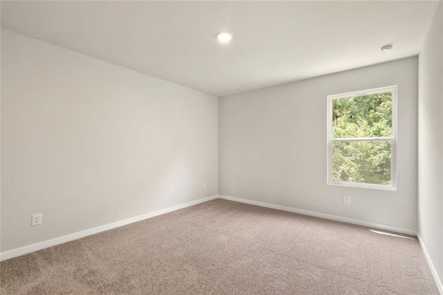 Spacious, unfurnished interior of a new home in Windsong Estates, McDonough (Image 12).