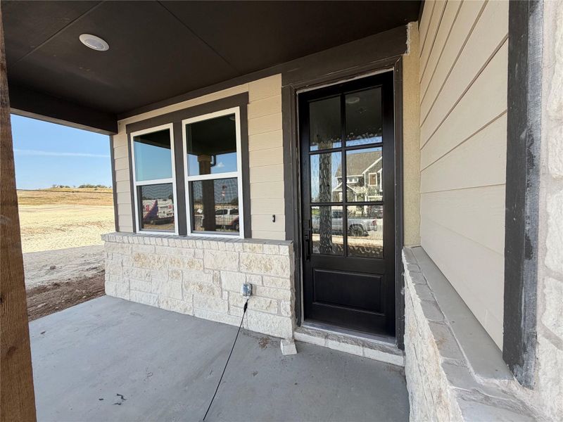 Exterior details and patio area of a home in Cannon Ranch 45s, Dripping Springs (Image 2). Exterior details and patio area of a home in Cannon Ranch 45s, Dripping Springs (Image 2).