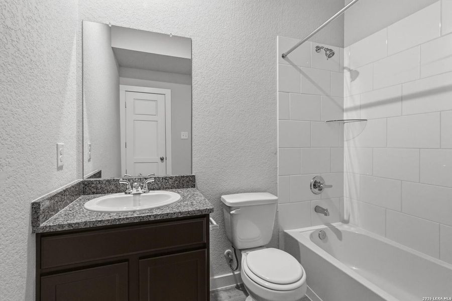Furnished interior view inside a new home in Red Hawk Landing, San Antonio (Image 8).