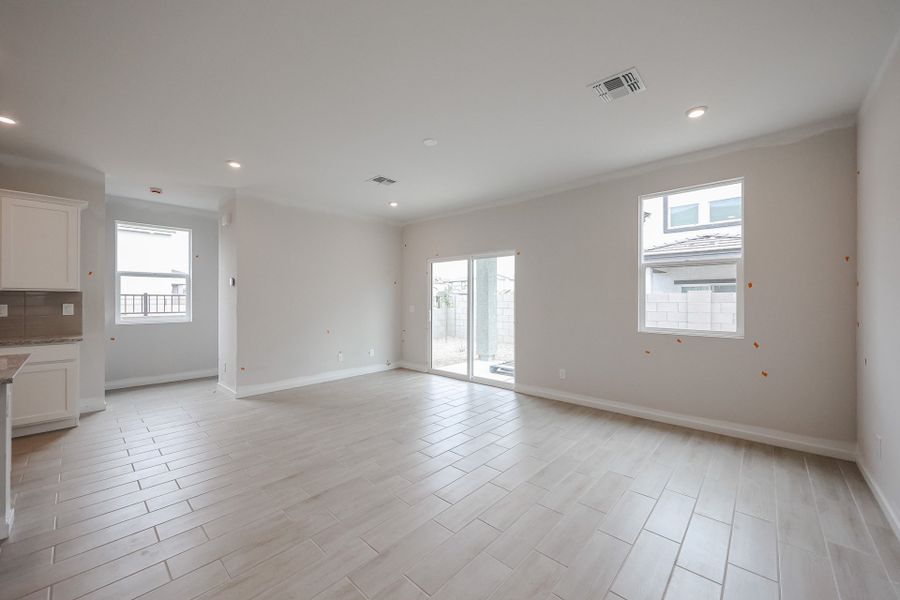 A room with white walls and windows. A room with white walls and windows.