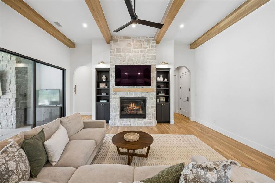 This inviting space features abundant natural light, creating a warm and comfortable atmosphere that is ideal for engaging in lively conversations or playing games.