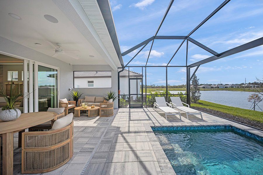Representative exterior details of a home built from the Mooring by Homes by Towne in Shellstone at Waterside, Sarasota (Image 3). Representative exterior details of a home built from the Mooring by Homes by Towne in Shellstone at Waterside, Sarasota (Image 3).