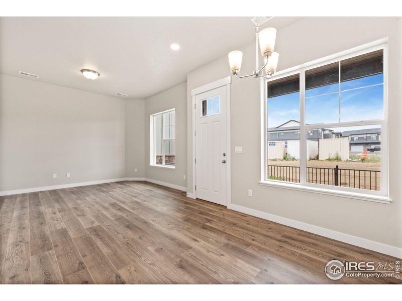 Spacious, unfurnished interior of a new home in The Lakes at Centerra - Discovery, Loveland (Image 15).