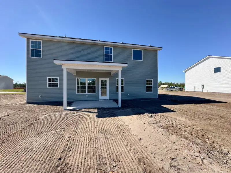 Exterior details and patio area of a home in Tibet Road at Sassafras, Allenhurst (Image 2).