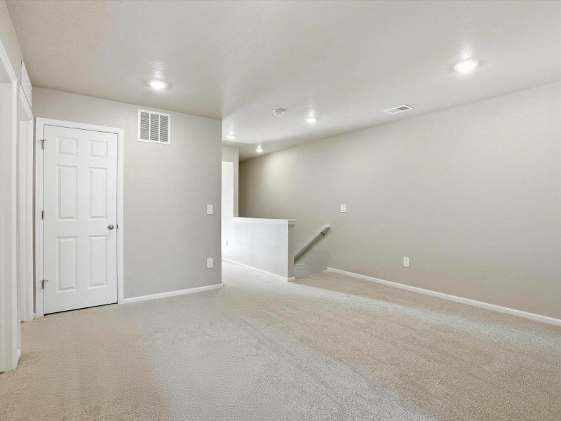 Spacious, unfurnished interior of a new home in Poudre Heights: The Meadow Collection, Windsor (Image 8).