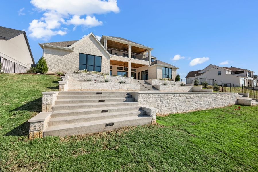 Exterior details and patio area of a home in The Resort on Eagle Mt. Lake, Fort Worth (Image 33).