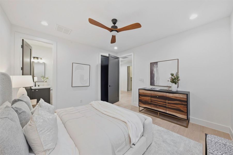 Fourth bedroom offers privacy, generous closet space, and its own full ensuite bath.