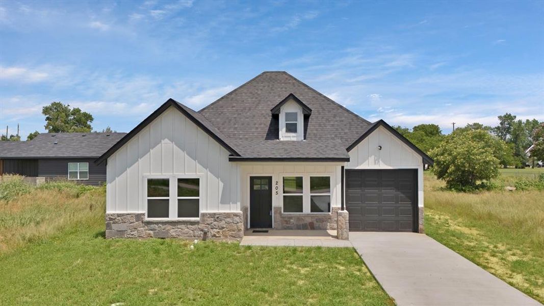 Front exterior of a new home in , Itasca, TX, highlighting curb appeal (Image 25). Front exterior of a new home in , Itasca, TX, highlighting curb appeal (Image 25).