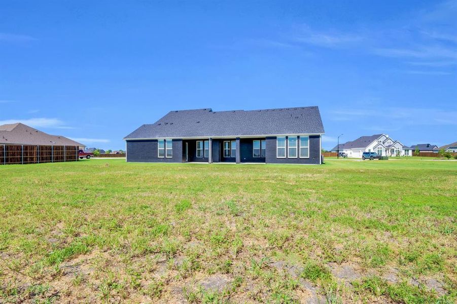 Exterior details and patio area of a home in Springside Estates II, Waxahachie (Image 22). Exterior details and patio area of a home in Springside Estates II, Waxahachie (Image 22).