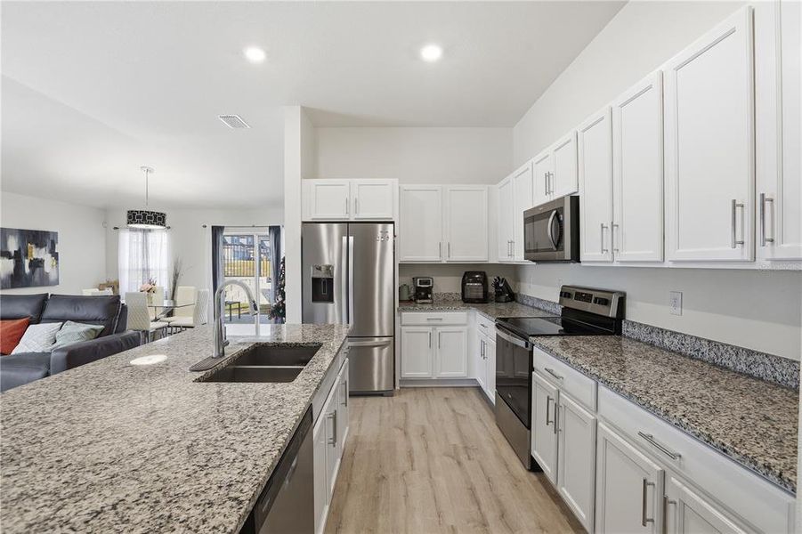 Furnished interior view inside a new home in Bellaviva I at Westside, Davenport (Image 11).