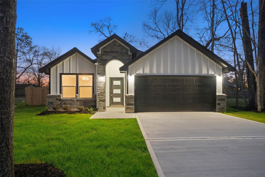 Front exterior of a new home in , Cleveland, TX, highlighting curb appeal (Image 17).