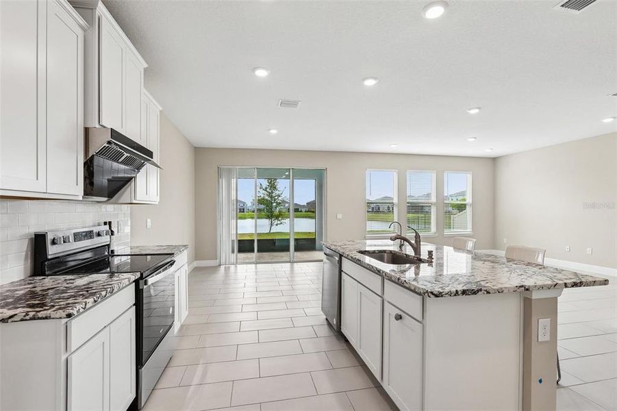 Furnished interior view inside a new home in Mangrove Manor, Apollo Beach (Image 7).