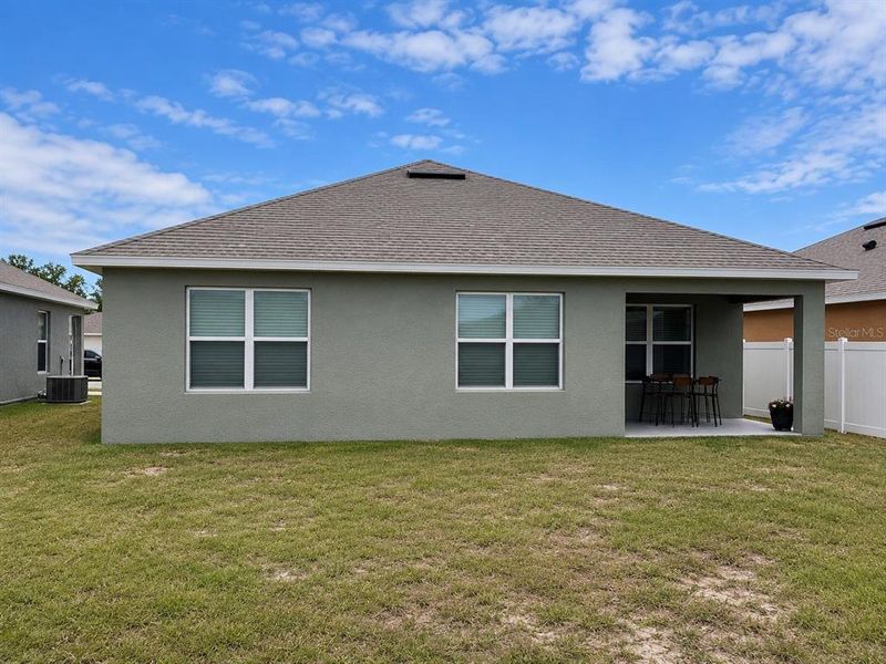 Exterior details and patio area of a home in Taylor Groves, Lake Wales (Image 10).