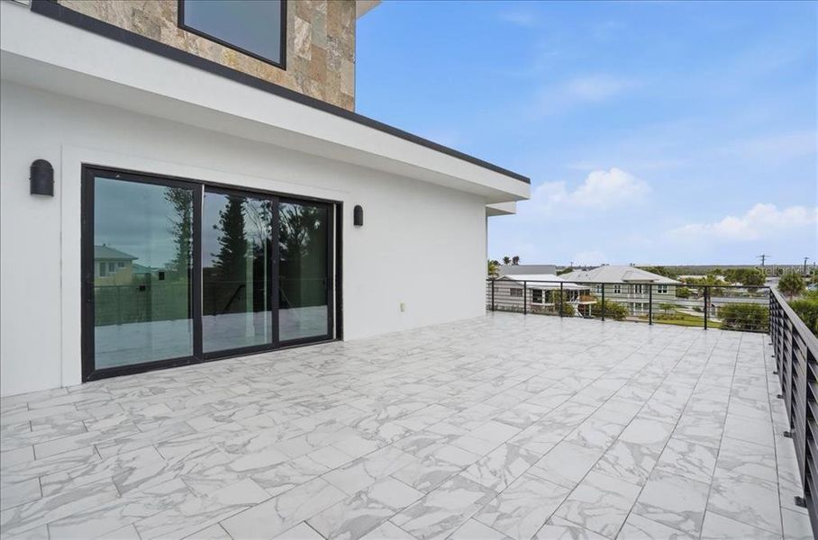 Exterior details and patio area of a home in , Englewood (Image 4).