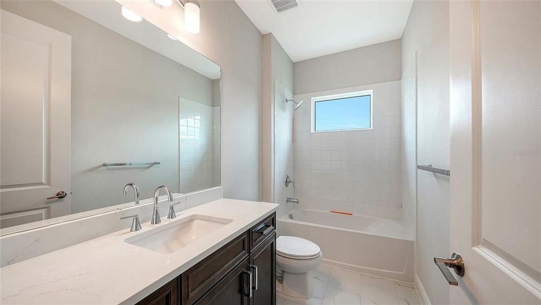 Furnished interior view inside a new home in Grand Park, Sarasota (Image 11). Furnished interior view inside a new home in Grand Park, Sarasota (Image 11).