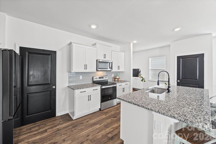 Furnished interior view inside a new home in Fergus Crossing, York (Image 13).