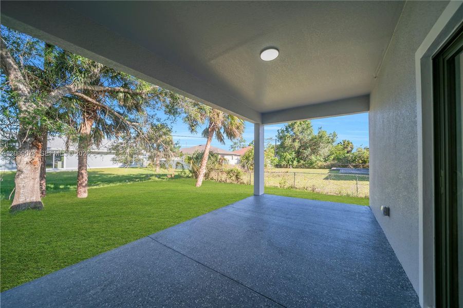 Exterior details and patio area of a home in , North Port (Image 25).