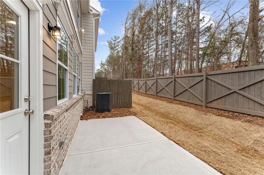 Exterior details and patio area of a home in Wildwood Place, Powder Springs (Image 3).