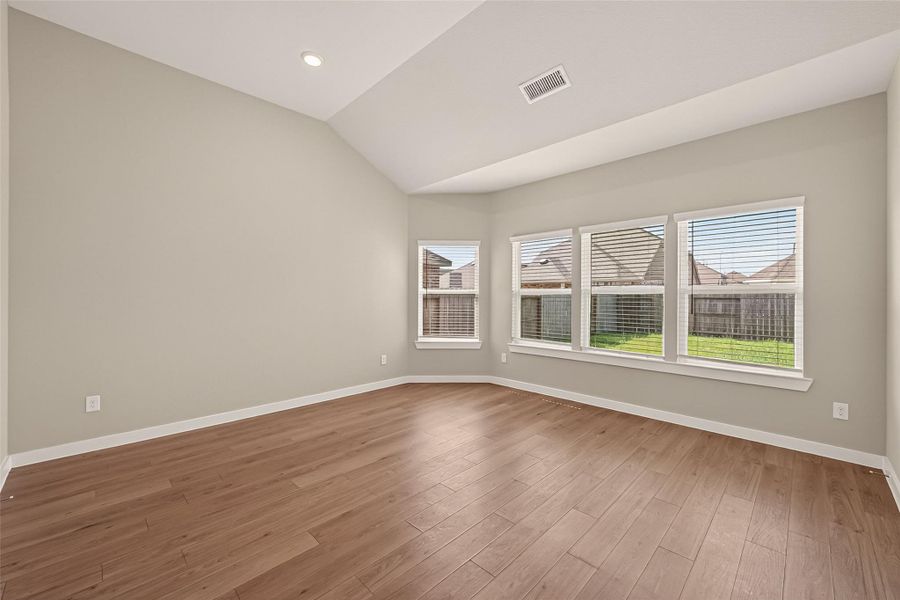 The spacious primary suite offers a peaceful retreat with relaxing views of the backyard. The spacious primary suite offers a peaceful retreat with relaxing views of the backyard.