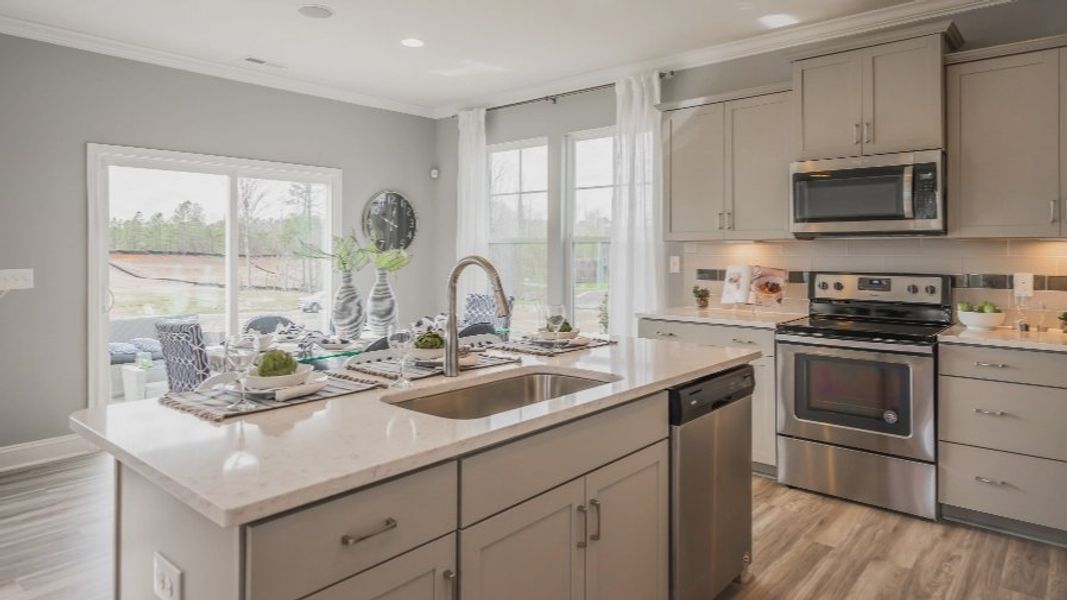 Furnished interior view inside a new home in Sidney Creek Single Family, Zebulon (Image 6).