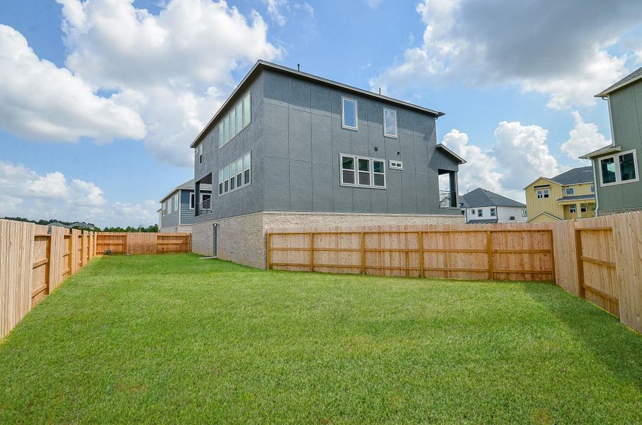 This home offers a fully fenced backyard ensuring privacy. This home offers a fully fenced backyard ensuring privacy.