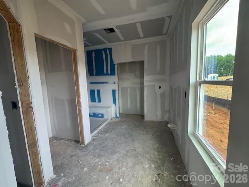 Primary bath, shower with tile surrounds