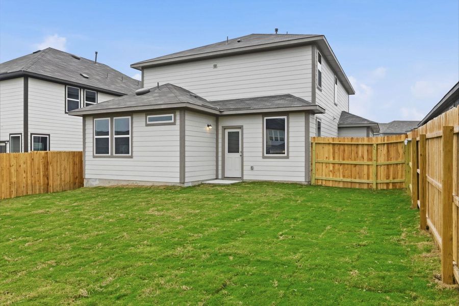 Rear of Home and Private Backyard
