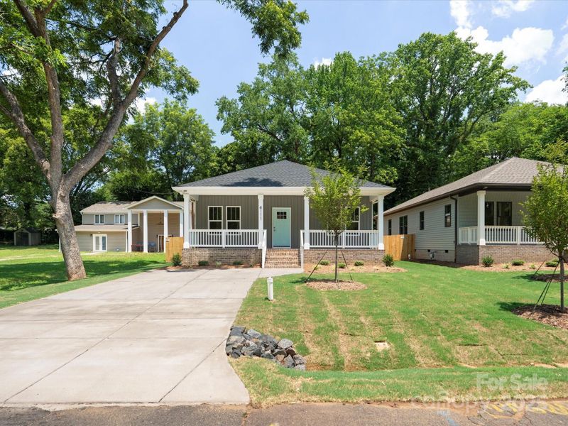 Front exterior of a new home in , Charlotte, NC, highlighting curb appeal (Image 2).