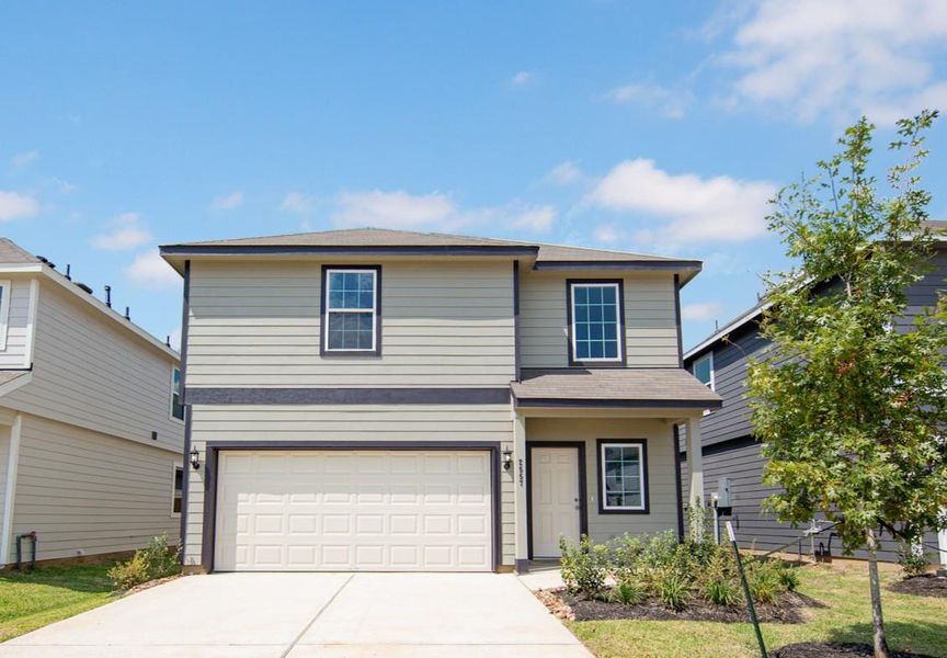 Front exterior of a new home in Cliffstone Hills, Conroe, TX, highlighting curb appeal (Image 12). Front exterior of a new home in Cliffstone Hills, Conroe, TX, highlighting curb appeal (Image 12).