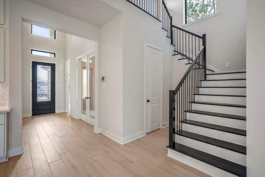 Spacious, unfurnished interior of a new home in ARTAVIA 55' Lots, Conroe (Image 39). Spacious, unfurnished interior of a new home in ARTAVIA 55' Lots, Conroe (Image 39).