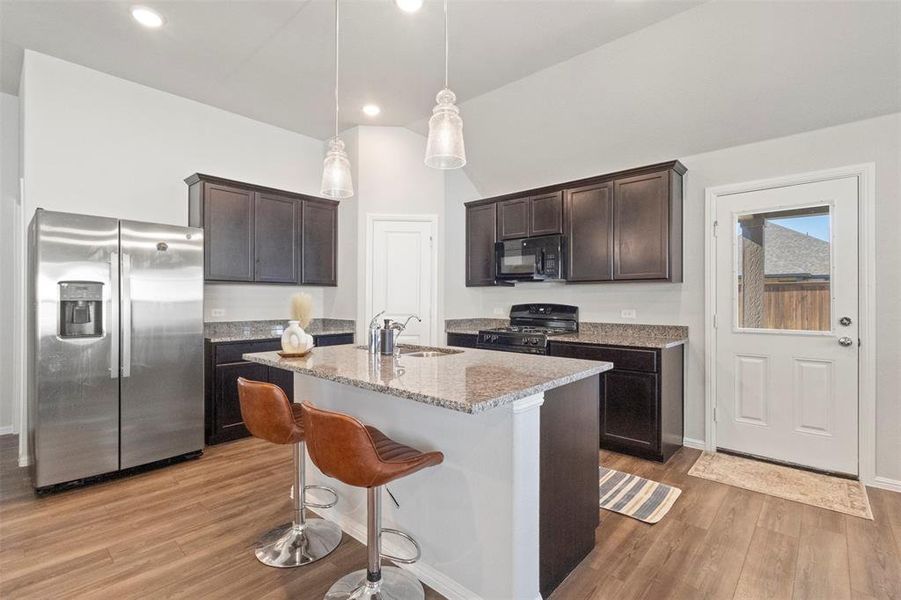 Furnished interior view inside a new home in Light Farms - Sweetwater, Celina (Image 15).