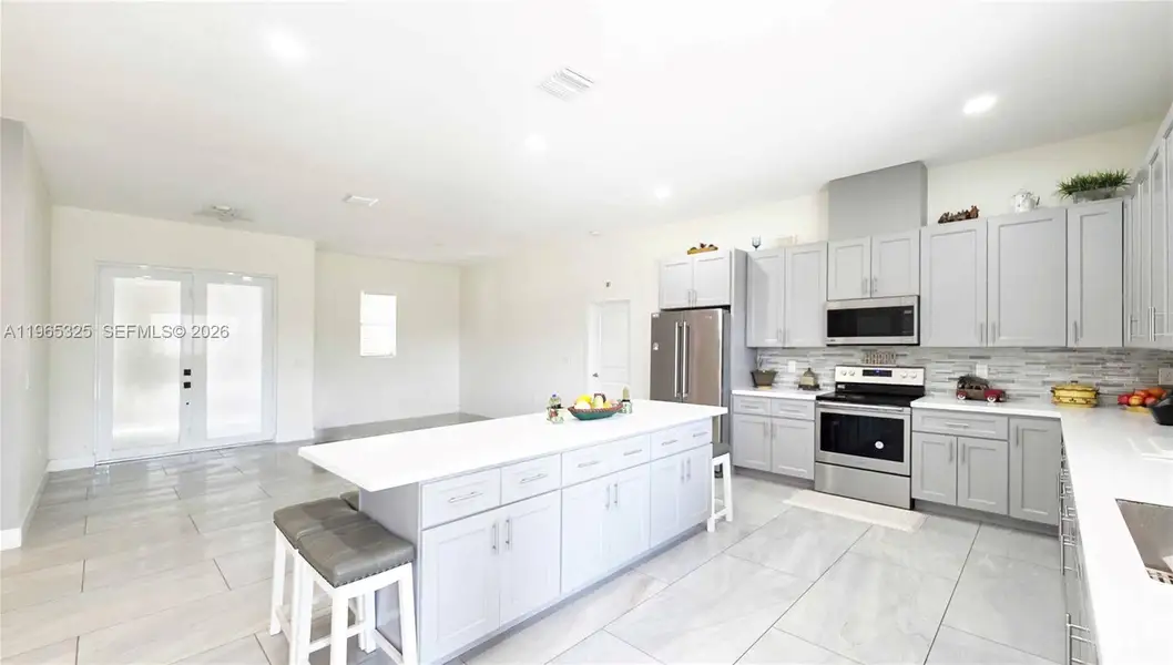 Furnished interior view inside a new home in , Clewiston (Image 8).