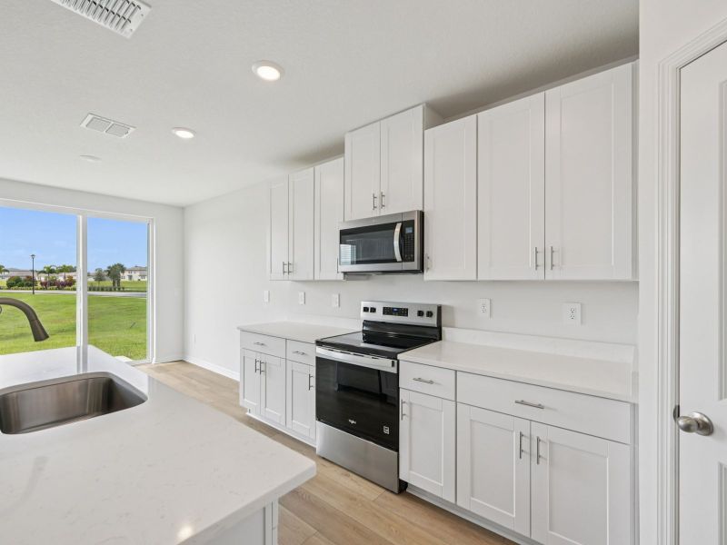 Furnished interior view inside a new home in Salt Meadows - Classic Series, Parrish (Image 3).