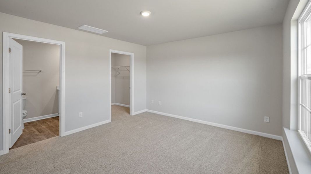 Representative unfurnished interior of a home built from the FREEPORT by D.R. Horton in River's Edge, Mayodan (Image 18).