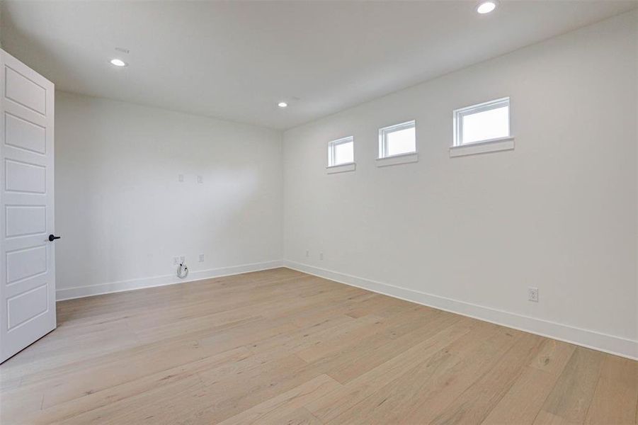 Empty room with light wood-type flooring