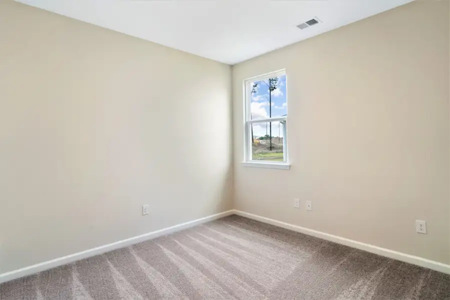 Spacious, unfurnished interior of a new home in Heritage Park at Longs, Longs (Image 18).
