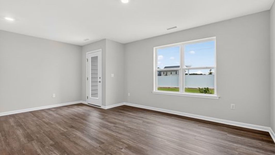 Spacious, unfurnished interior of a new home in The Townes at Belle Grove, Wendell (Image 11).