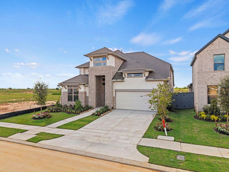 Front exterior of a new home in Jubilee, Hockley, TX, highlighting curb appeal (Image 21).