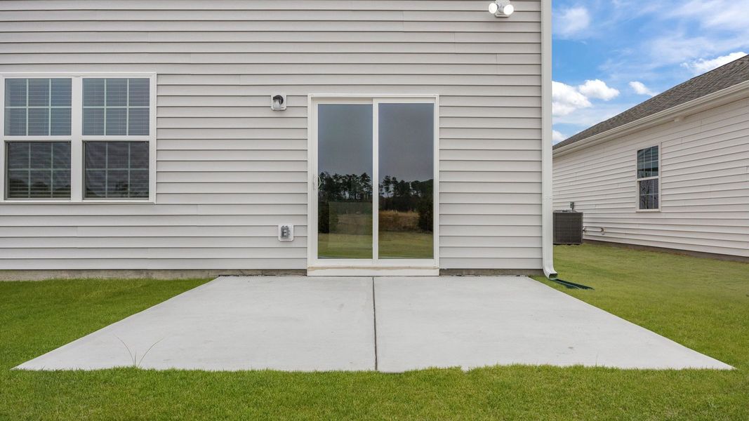 Exterior details and patio area of a home in Ridgewood Farms, Winterville (Image 4). Exterior details and patio area of a home in Ridgewood Farms, Winterville (Image 4).