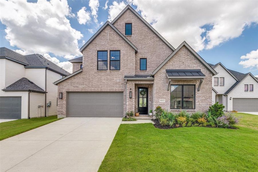 Front exterior of a new home in , McKinney, TX, highlighting curb appeal (Image 1). Front exterior of a new home in , McKinney, TX, highlighting curb appeal (Image 1).