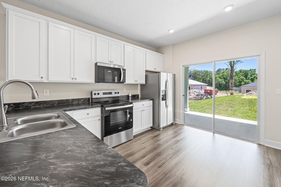 Furnished interior view inside a new home in , Jacksonville (Image 8).
