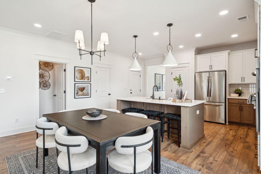 Furnished interior view inside a new home in Tidewater at Lakes of Cane Bay, Summerville (Image 21).